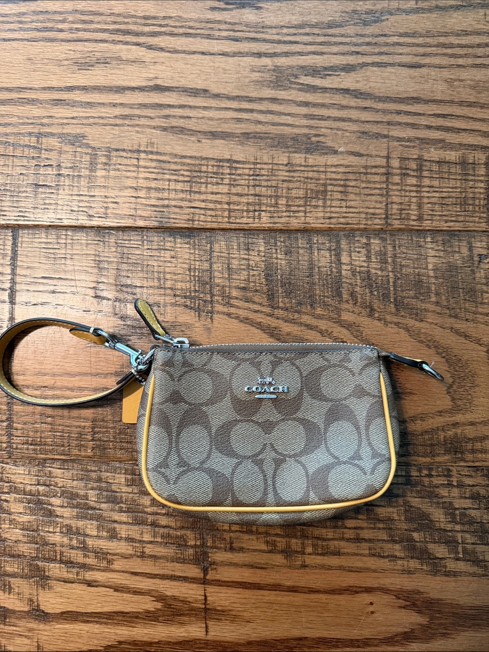 Coach Brown Signature Canvas Wristlet with Yellow Trim
